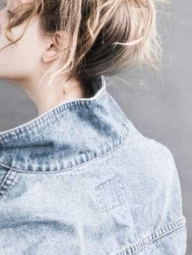 Girl into blue jeans jacket.